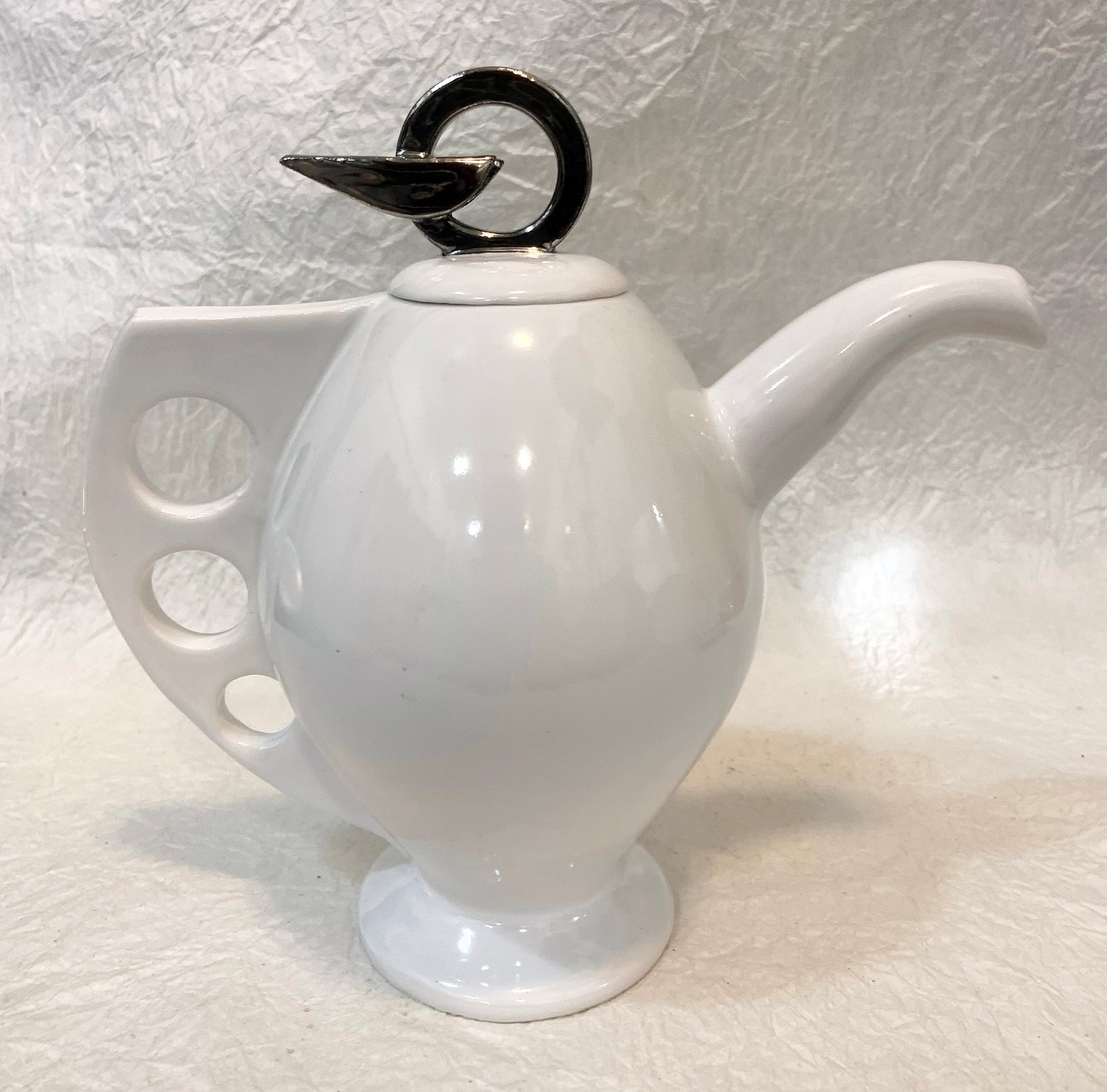 Winged teapot