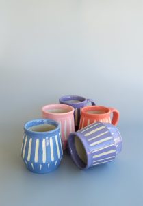 Pastel colored mugs